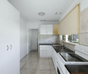 CENTRAL LOCATION- FULLY FENCED HOME - Photo 5