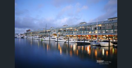 Renovated 2 Bedroom Apartment with Bridge Views & Lock Up Garage - Photo 4