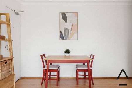 Leafy Top-Floor Haven with Dual Balconies and Modern Comfort - Photo 2