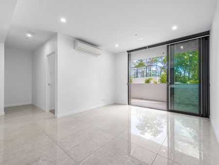 1 bedroom unit with a fridge & a washing machine/dryer - Photo 2