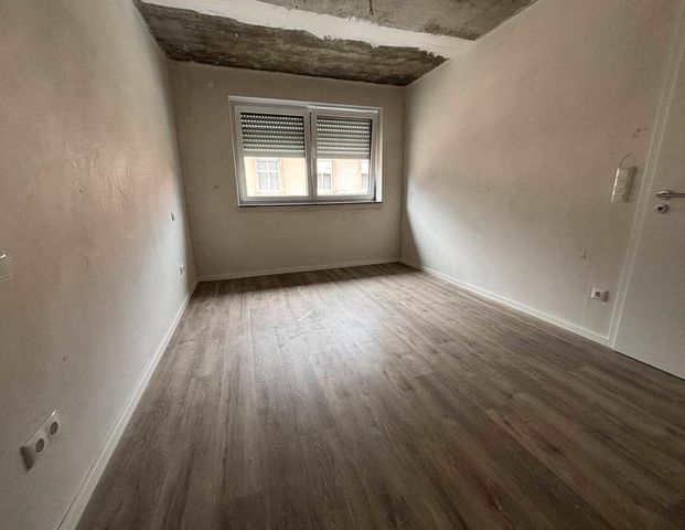 Neubau, geräumige Obergeschosswohnung mit Balkon - Photo 1