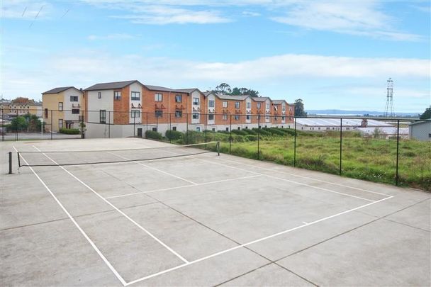 Sought After Complex! - Photo 1