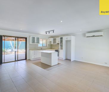 Renovated Air Conditioned Family Home with Solar - Photo 2