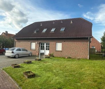 58m2 Erdgeschosswohnung mit Terrasse & Garten in Halbemond - Foto 1