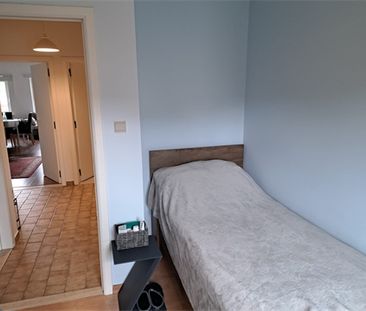 Een appartement op de eerste verdieping met garage en tuintje - Foto 6