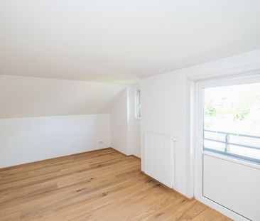 Geräumige Dachgeschoßwohnung mit Garten direkt am Mühlbach - Foto 1