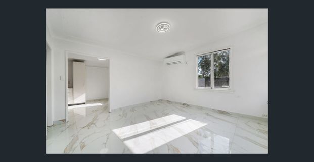 Spacious 3-Bedroom Modern Family Home in the Heart of Busby - Photo 1