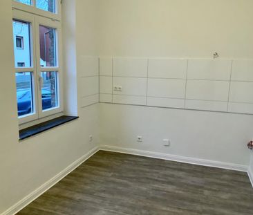 Kleines Reihenmittelhaus mit Altbaucharme - Photo 2