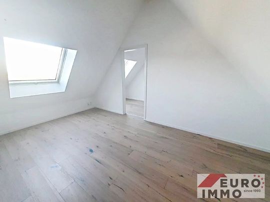 Stilvolles und modernes Wohnen nahe aller Annehmlichkeiten im Grenzgebiet – Duplex-Wohnung mit Gartennutzung und Garage - Foto 1