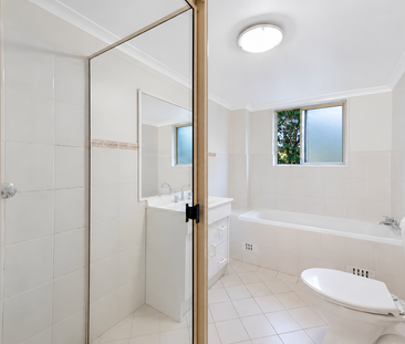 Spacious Two-Bedroom Apartment with Balcony & Two Car Spaces - Photo 3