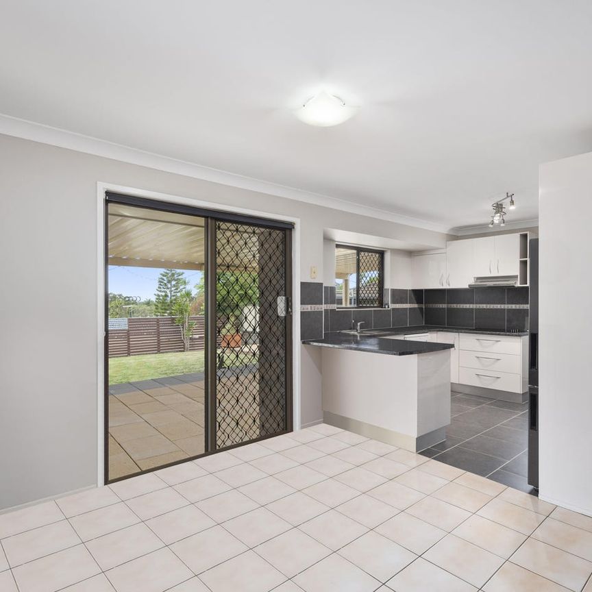 Spacious 4-Bedroom Home in Prime Carrara Location - Photo 1