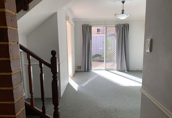 Townhouse Living in a Secure Complex - Photo 1