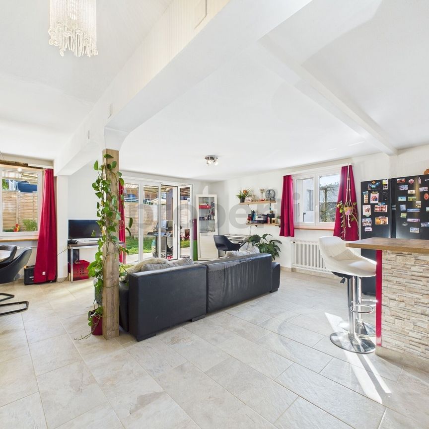 Modern 4.5-room terraced house with garden in Büsserach - Photo 1