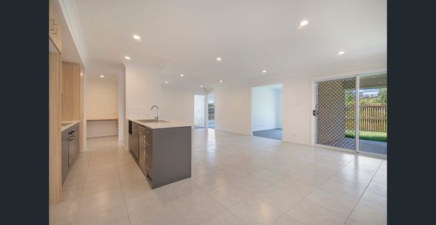 Brand New 4-Bedroom Home in a Great Location - Ready for Immediate Move-In - Photo 1