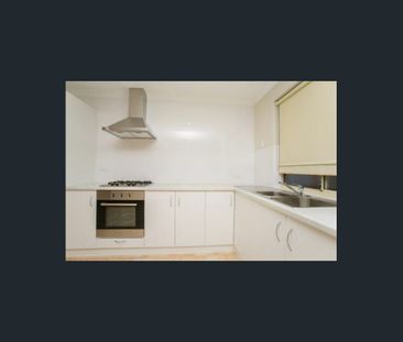 A Bright Three Bedroom Home with Its Own Courtyard - Photo 4