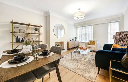 A beautifully presented two bedroom flat situated on the first floor of this well run portered block on Kensington High Street moments away from the green spaces of Holland Park too. EPC rating: D - Photo 3