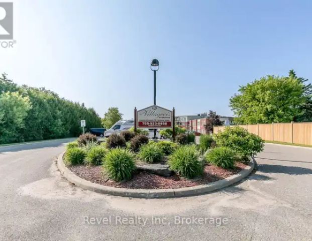 105 - 333 LAFONTAINE ROAD W | 105 - 333 LAFONTAINE ROAD W, Tiny - Photo 1