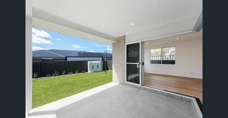 Contemporary 4 Bedroom Home in Logan Estate - Photo 2