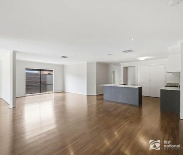 This spacious family home offers comfortable living in a convenient... - Photo 1