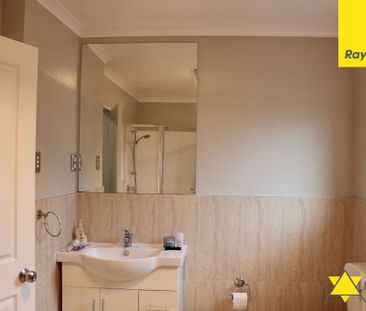 This immaculate four bedroom home is both private and welcoming and... - Photo 6
