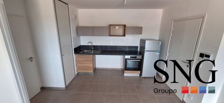 T1 BIS AVEC TERRASSE ET PARKING - Photo 2