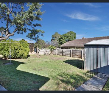 Charming Three Bedroom Corner Home with Great Outdoor Space - Photo 6