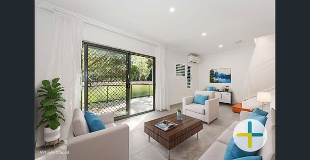 Immaculately renovated two Bedroom split-level Townhouse + Loft / Storage - Photo 1