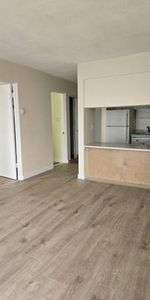 A bright renovated 1 bedroom suite - Photo 3