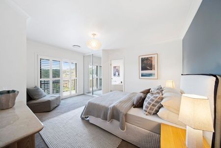 LIGHT-FILLED FAMILY RETREAT OFFERING SPACE AND CONVENIENCE - Photo 5