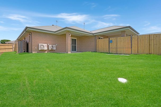 "Modern and Low-Maintenance" - Photo 1