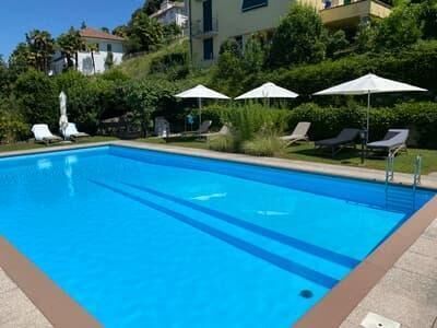 Kurz- oder Langzeitvermietung - Panoramawohnung mit Seeblick Ruvigliana / 2.5 loc.vista Lago con piscina (anche brevi periodi) - Photo 3