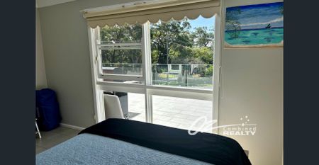 Upstairs 2-Bedroom Unit with Large Balcony – Close to Huskisson Waterfront & Main Street, Including utilities and Lawn Maintenance - Photo 5