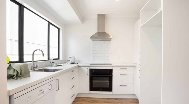 Refurbished Three-Bedroom, Two-Bathroom Townhouse in the Heart of Paraparaumu Beach - Photo 1