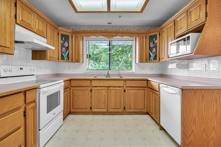 Spacious 55+ Condo with Elevator Access - Photo 4