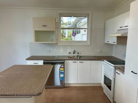 FRESHLY UPDATED HOME IN A FAMILY-FRIENDLY LOCATION - Photo 2