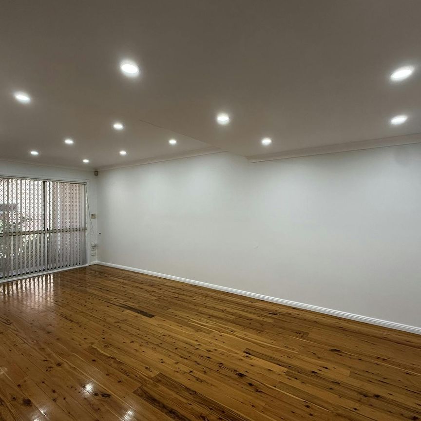 NEWLY RENOVATED TOWNHOUSE - Photo 1