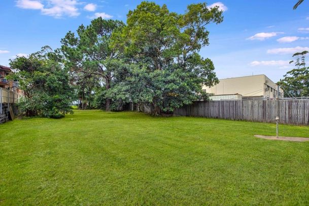 MODEST COTTAGE ON LARGE FLAT BLOCK - Photo 1