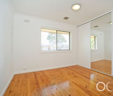 Open the Door to Easy Living with a Big Backyard in Tranmere - Photo 2