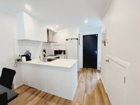 Stylish 2-Bedroom Home with Modern Comforts & Private Outdoor Spaces - Photo 5