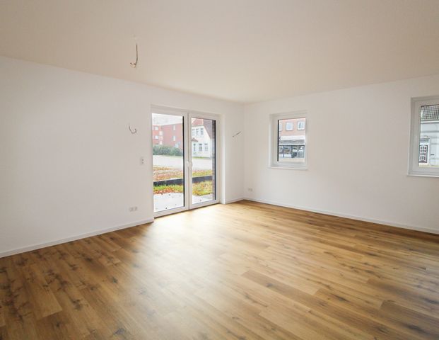 ERSTBEZUG! EG-Wohnung mit überdachtem Stellplatz und ca. 103m²! - Foto 1