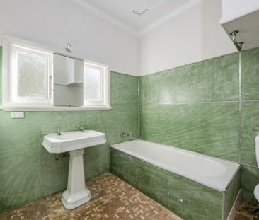 Charming 3-Bedroom Home with Water Views in East Gosford! - Photo 5