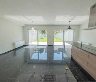 RUIM GELIJKVLOERS APPARTEMENT MET 2 SLPKS EN TUIN MET TERRAS. - Photo 5