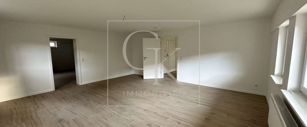 Erstbezug nach Modernisierung von geräumiger Souterrain-Wohnung (2 ZKDB) mit Terrasse und Stellplatz - Foto 1