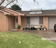 spacious four-bedroom home in the heart of Shoalhaven Heads - Photo 1