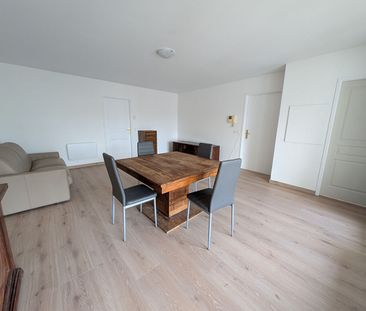 Location Appartement 4 pièces 91m² - Photo 3