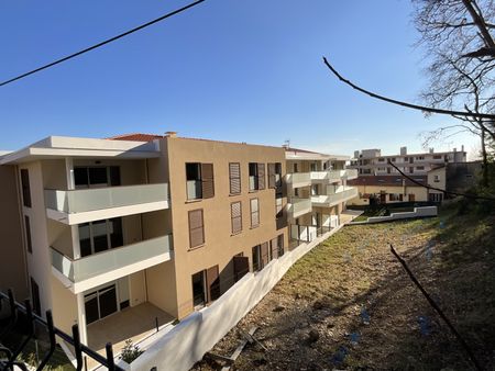 Centre ville 2 pièces rez de jardin dans résidence neuve - Photo 2