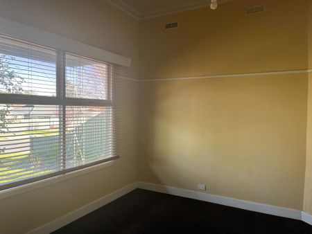 IDEALLY SITUATED AND UPDATED THREE BEDROOM HOME - Photo 5