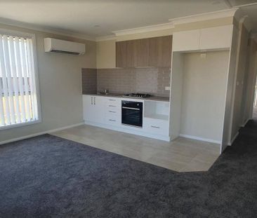 LOW MAINTENANCE LIVING - Photo 2