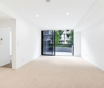 Brand New Split-Level Three-Bedroom Apartment with Huge Entertainer's Courtyard - Photo 1