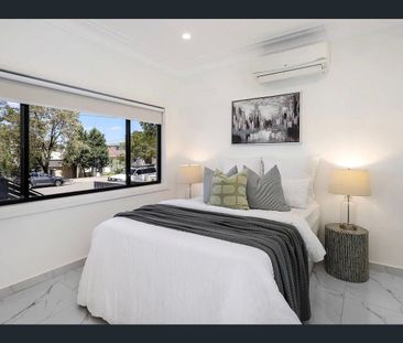 Modern 4-Bedroom Family Living with Space, Style & Convenience - Photo 4